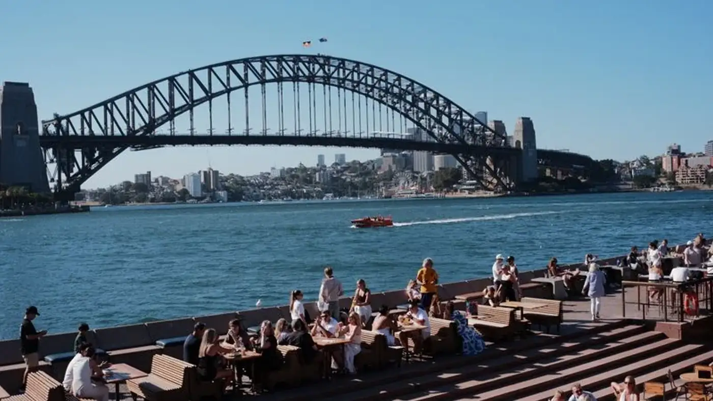 Editorial photograph of a family reunion at a Sydney cafe