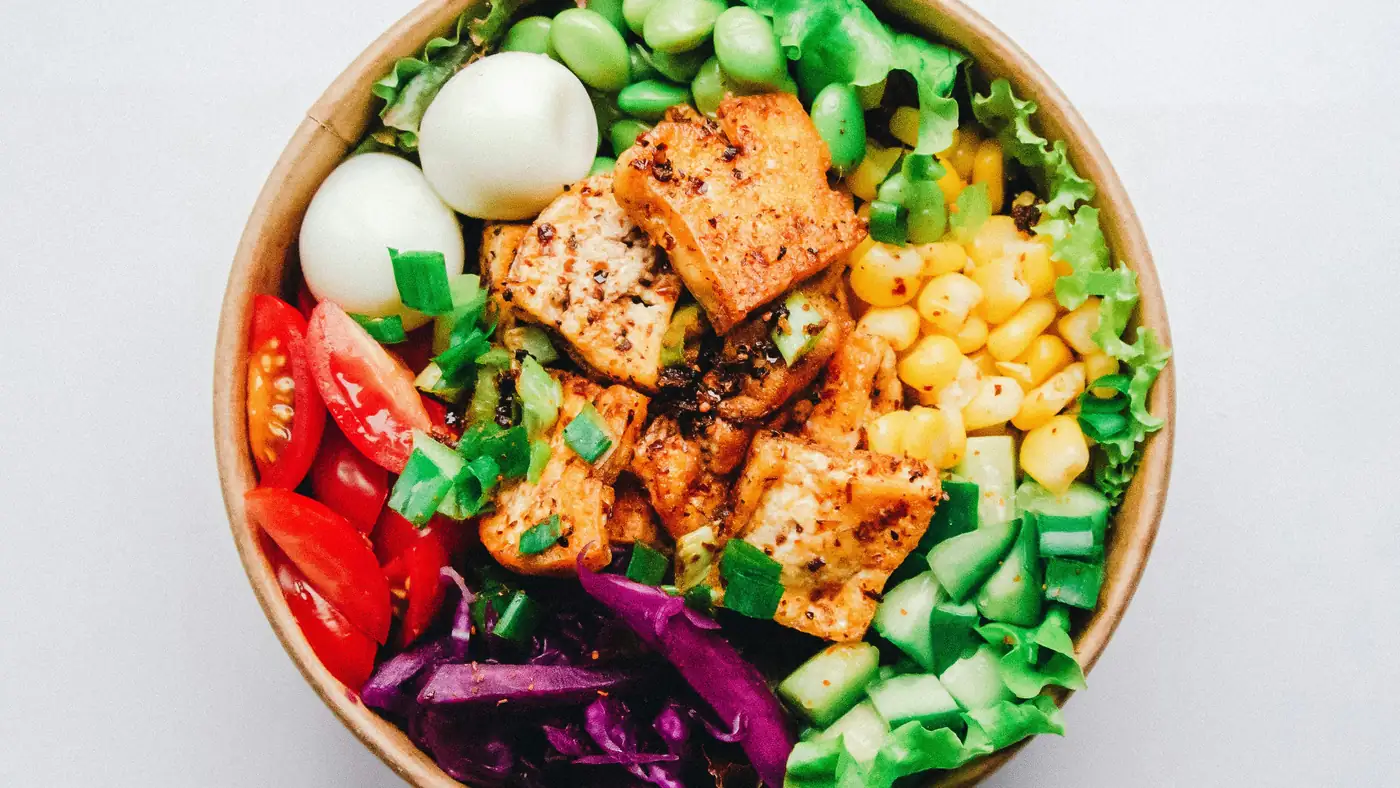 Vietnamese pho bowl with fresh herbs and rice noodles in a Sydney restaurant