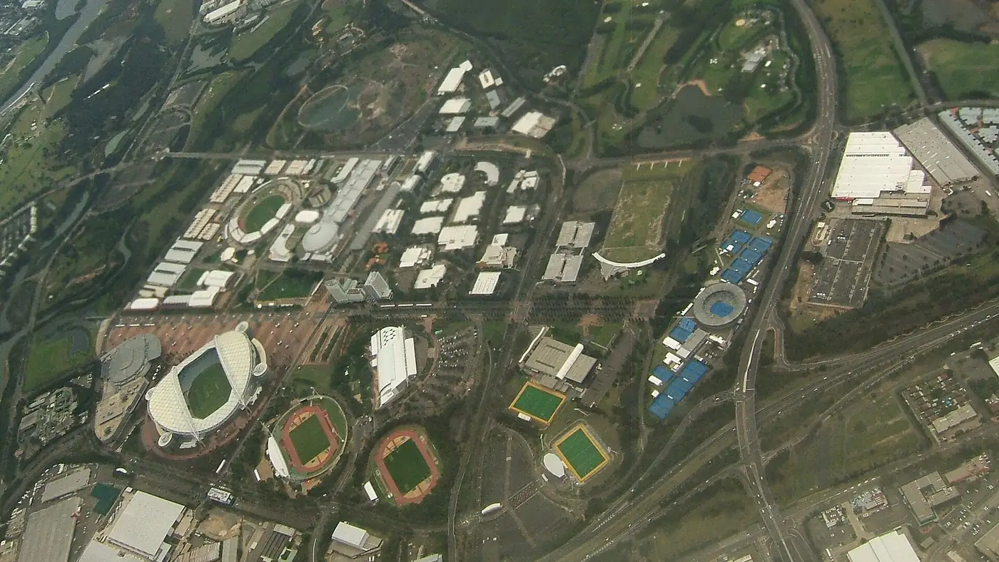 Aerial view of Sydney Olympic Park, where the 2050 master plan lifts development capacity sharply